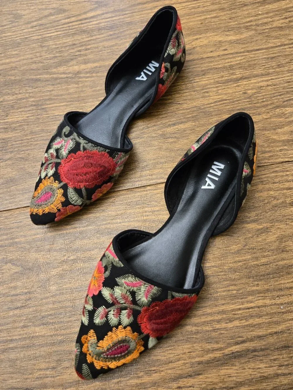 MIA Caroline Floral Embroidered d'Orsay Pointed Toe Flats on Black Background
